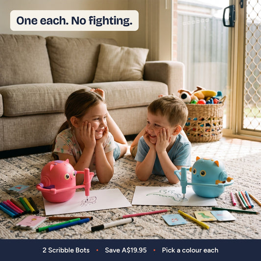 Two siblings on a rug, each with their own Scribble Bot